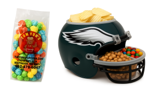 a NFL football helmet with a small bag of popcorn